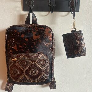 Merrick’s Boutique backpack and wallet! (Never carried)